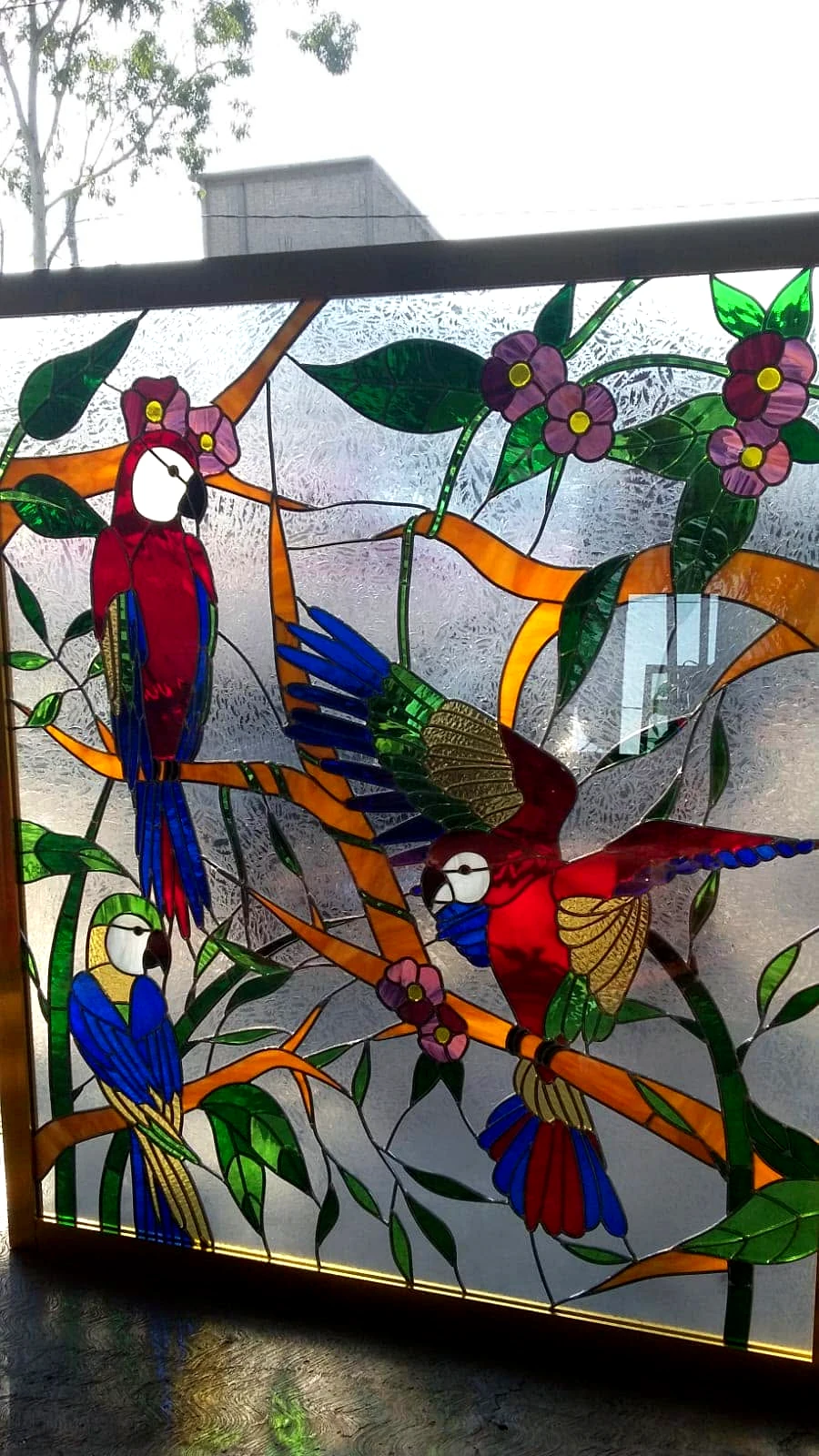 Vitral con cotorros